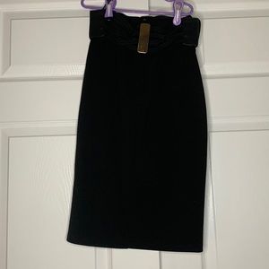 Black skirt with leather and gold belt
